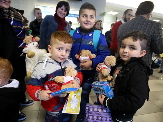 Iráčtí křesťané v Česku Přílet iráckých křesťanských uprchlíků do Prahy