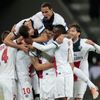 Paris St. Germain's players celebrate a goal against Bayer Leverkusen during their Champions League soccer match in Leverkusen