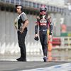 Toro Rosso Formula One driver Verstappen of the Netherlands walks back to his team garage after leaving his car on the track during the Australian Formula One Grand Prix in Melbourne