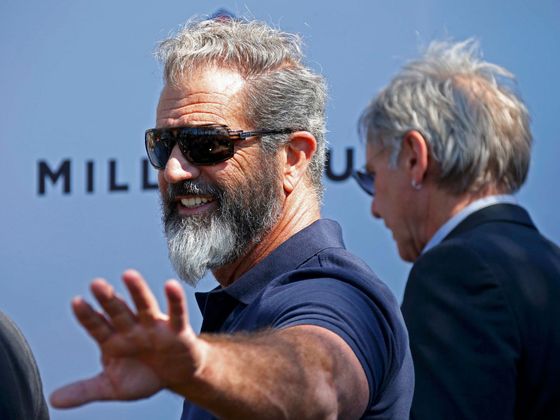 Pozor! Tady potkáte Mela Gibsona Cast members Mel Gibson and Harrison Ford pose during a photocall on the Croisette to promote the film "The Expendables 3" during the 67th Cannes Film Festival in Cannes