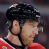 Blackhawks' Hossa looks out from his helmet as he plays agai