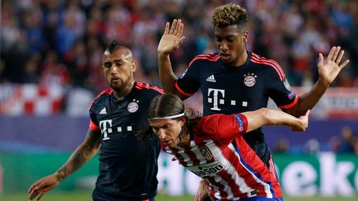 Bayern Munich's Kingsley Coman in action with Atletico Madrid's Filipe Luis