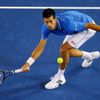 Djokovic of Serbia hits a return to Murray of Britain during their men's singles final match at the Australian Open 2015 tennis tournament in Melbourne