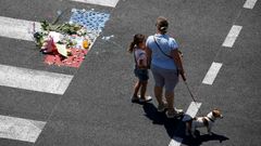 A makeshift memorial placed on the road during a minute of silence in Nice