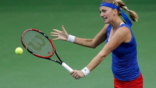 Czech Republic's Petra Kvitova returns a ball to Germany's Andrea Petkovic during their final match of the Fed Cup tennis tournament in Prague November 8, 2014. REUTERS/D