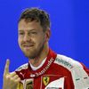 Ferrari Formula One driver Vettel of Germany gestures after qualifying for the Singapore F1 Grand Prix