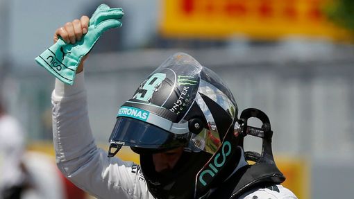 Mercedes Formula One driver Nico Rosberg of Germany celebrates after winning the pole position during the qualifying session of the Canadian F1 Grand Prix at the Circuit