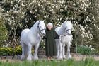 British Queen Elizabeth II holds her Fell ponies, Bybeck Nightingale (right) and Bybeck Katie in this handout picture released April 20, 2022 by The Royal Windsor Horse S
