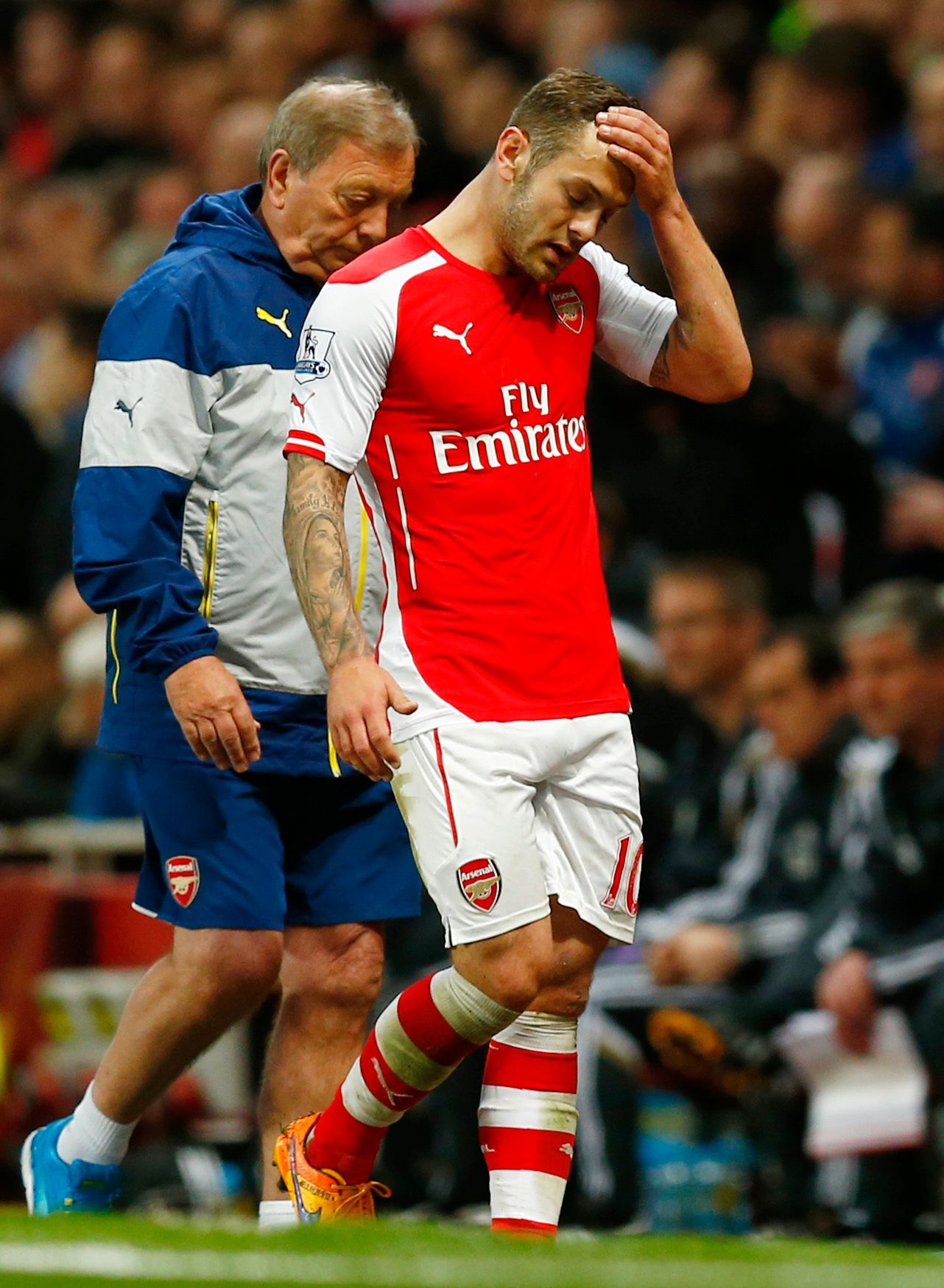 Football: Arsenal's Jack Wilshere looks dejected as he is substituted