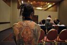 Úředníci, kteří mají tetování, mohou přijít o práci