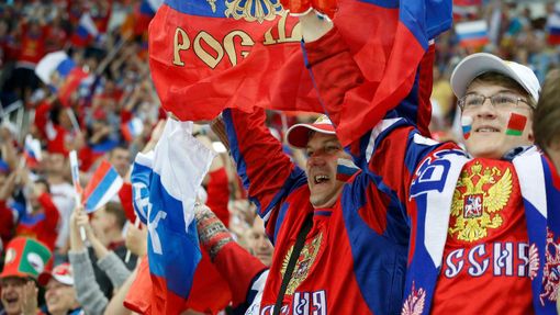 Russia's fans cheer during the first period of their men's ice hockey World Championship final game against against Finland at Minsk Arena in Minsk May 25, 2014. REUTERS/