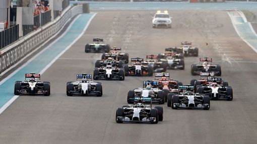 Mercedes Formula One driver Lewis Hamilton of Britain leads the pack as they approach the first turn during the Abu Dhabi F1 Grand Prix at the Yas Marina circuit in Abu D