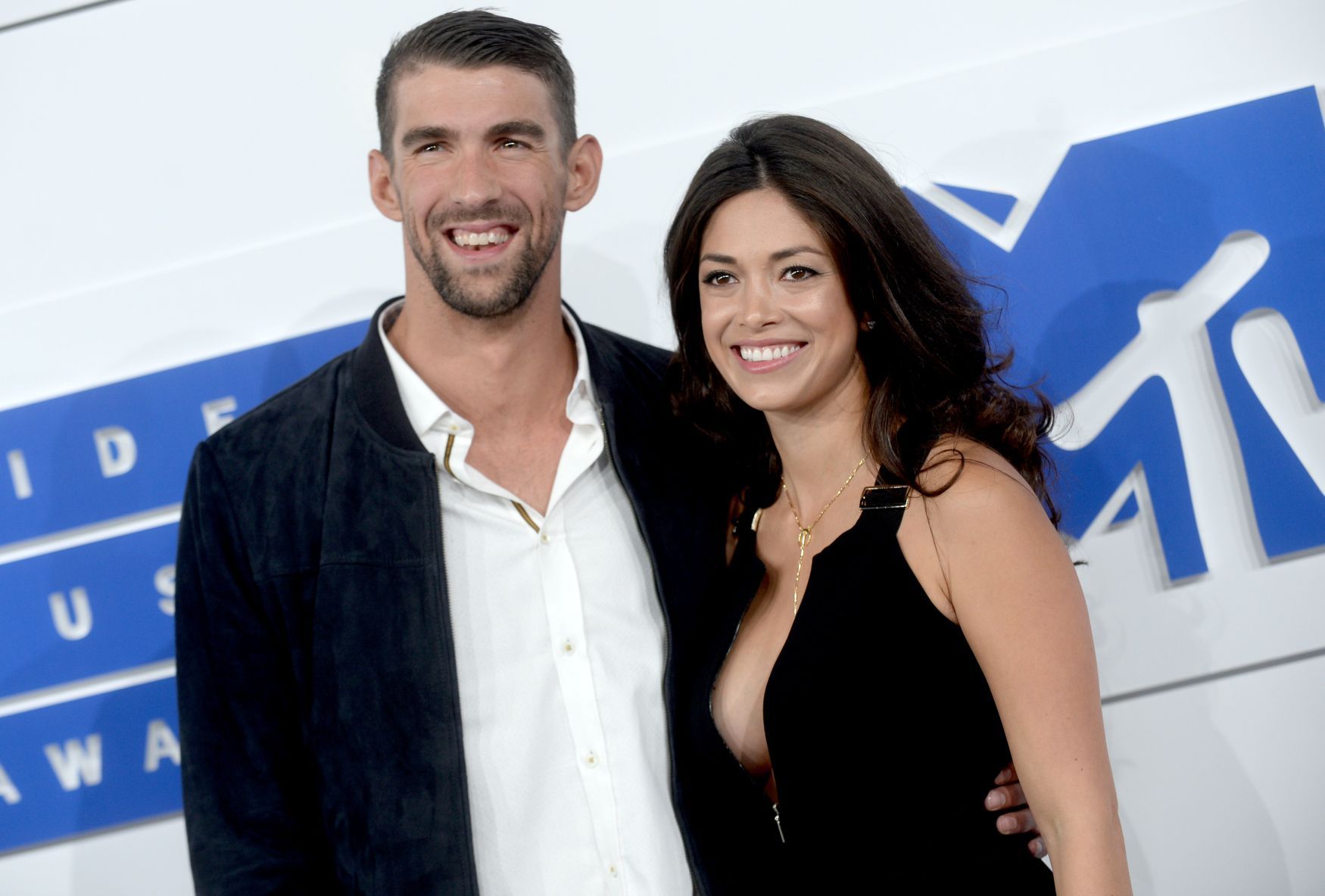 Michael Phelps a Nicole Johnsonová