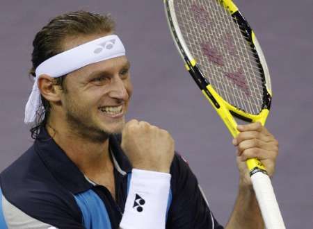 David Nalbandian se raduje, posedmé v kariéře porazil Federera | Foto: Reuters