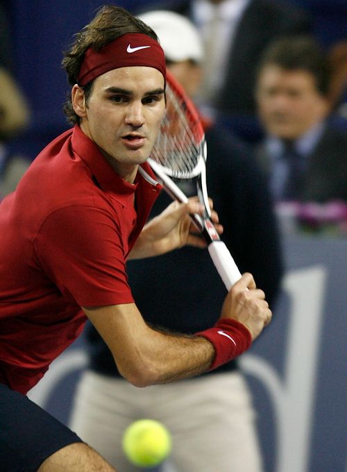 Roger Federer ve finále Turnaje mistrů hladce porazil Davida Ferrera. | Foto: Reuters