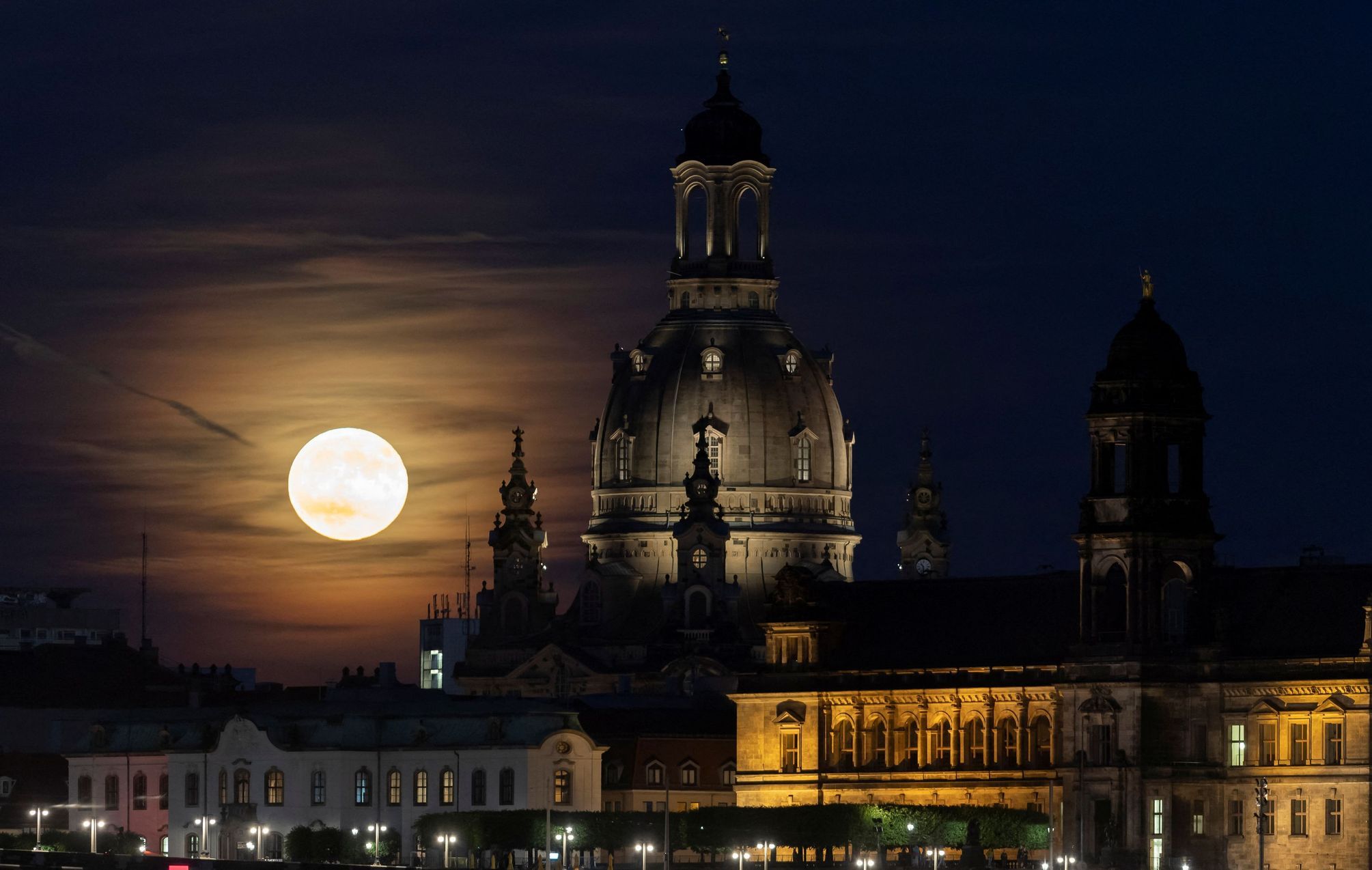 A deer supermoon will be visible in the sky.  The spectacle is partially spoiled by cloud cover