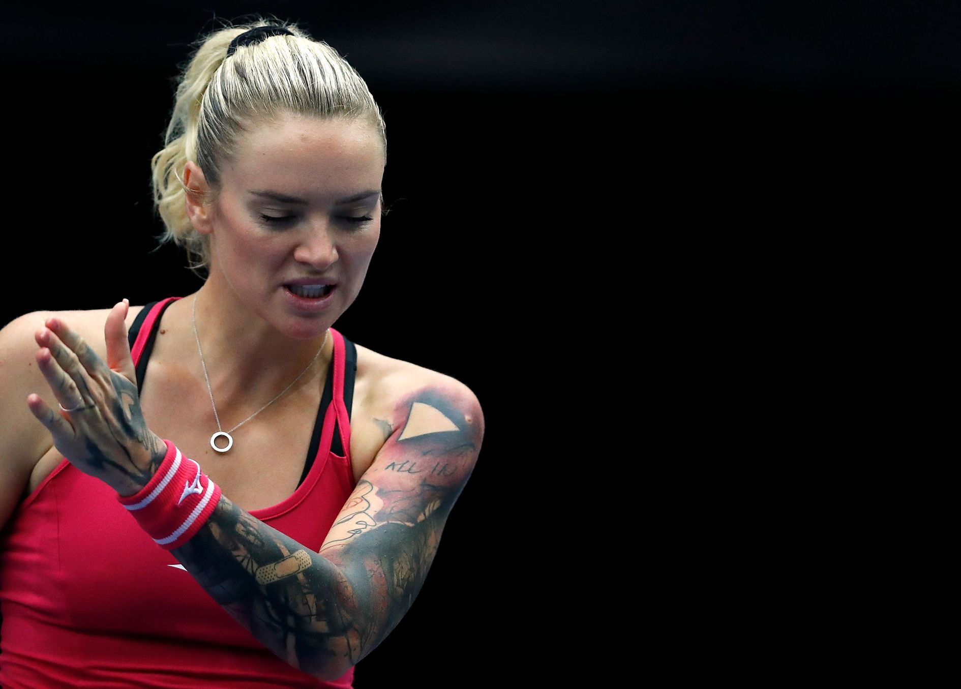 Tereza Martincova of Czech Republic tattoos during round 1 match between  Aryna Sabalenka and Tereza