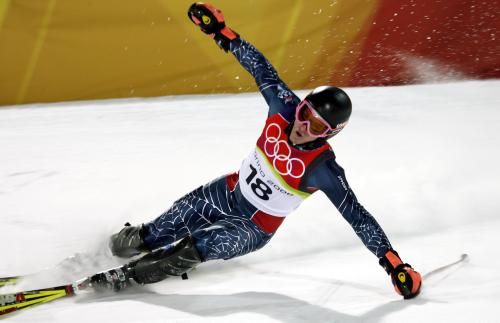 Ted Ligety z USA slaví po zisku zlaté medaile v olympijské. | Foto: Aktuálně.cz