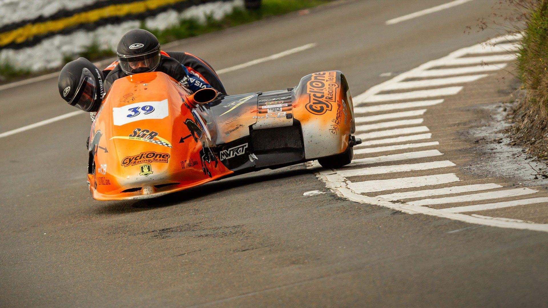 A tragic mistake.  It was not the co-driver but the driver who killed the sidecar at the Tourist Trophy