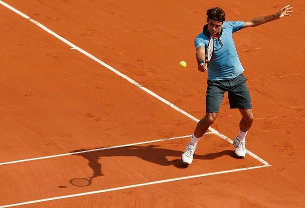 Roger Federer při bekhendu | Foto: Reuters