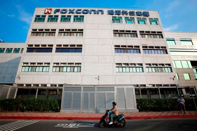 Tchajwanská společnost Foxconn sídlí hned v několika státech a městech. V Tuchengu na Tchajwanu... | Foto: Reuters