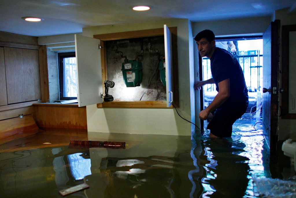 Flood service. Flooded Basement. Inside Flood House. Hurricane Adriana Floods Basement. Flooding of the Apartment.