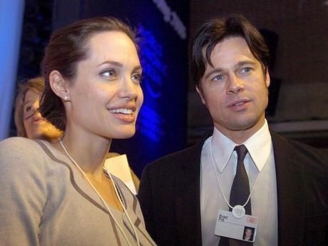 Na letošním fóru se neukáží, loni ale byli přítomni celé čtyři dny. Angelina Jolie a Brad Pitt. | Foto: WEF