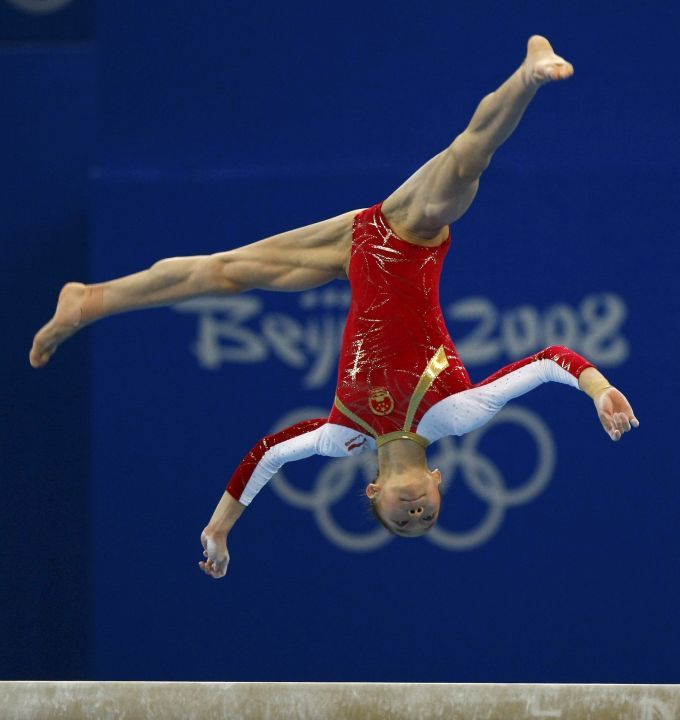 Gymnasitka. Jang I-lin, členka gymnastického družstva Číny, které údajně zfalšovala čínská delegace pas, aby byla starší 16 let | Foto: Reuters