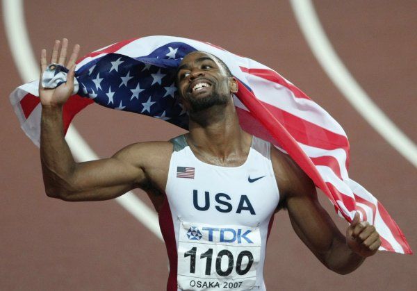 Američan Tyson Gay se raduje. Povedl se mu ceněný sprinterský double. | Foto: Reuters