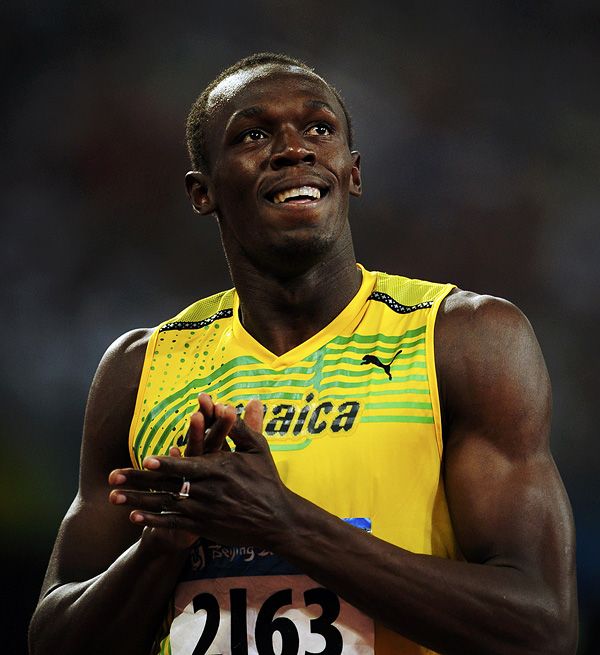 Jamaičan Usain Bolt se usmívá po zaběhnuté stovce na olympijských hrách v Pekingu. | Foto: Reuters