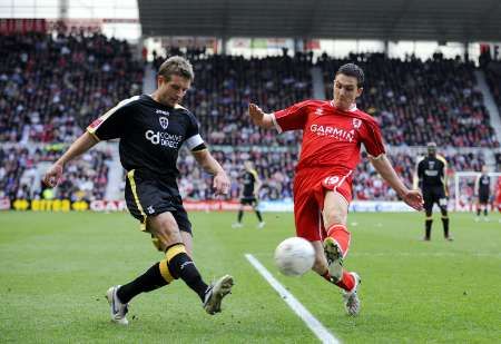 Steven McPhail z Cardiffu (vlevo) při vítězném čtvrtfinálovém zápase proti Middlesbrough | Foto: Reuters