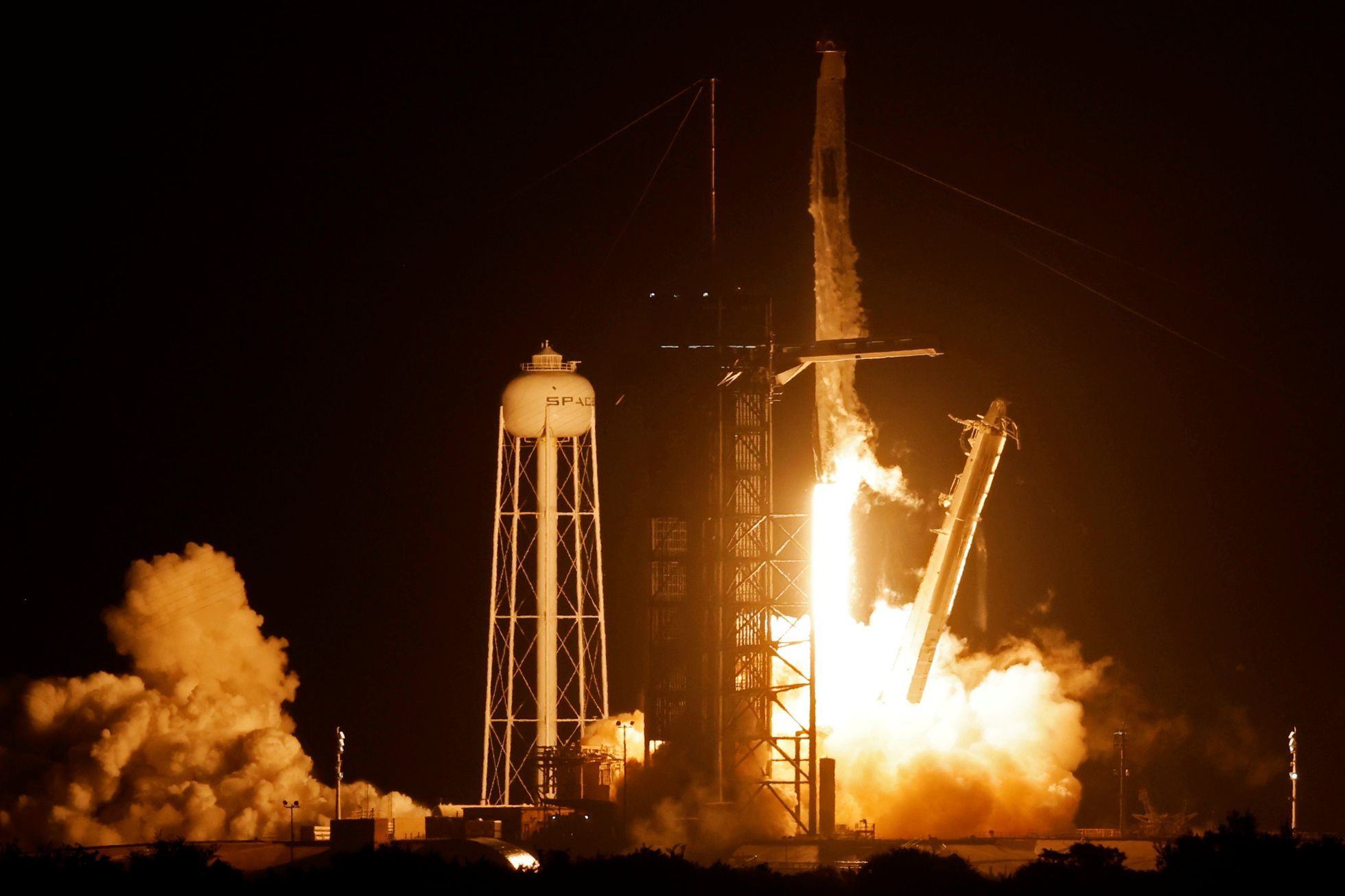 The SpaceX rocket launched from Florida.  He will take four astronauts to the space station