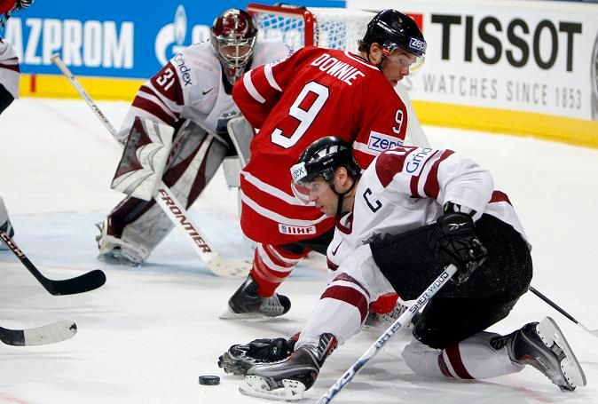 Marcel Dionne a Herberts Vasiljevs | Foto: Sport