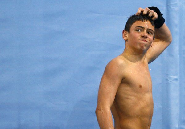 Thomas Daley studuje výsledkovou tabuli. | Foto: Reuters