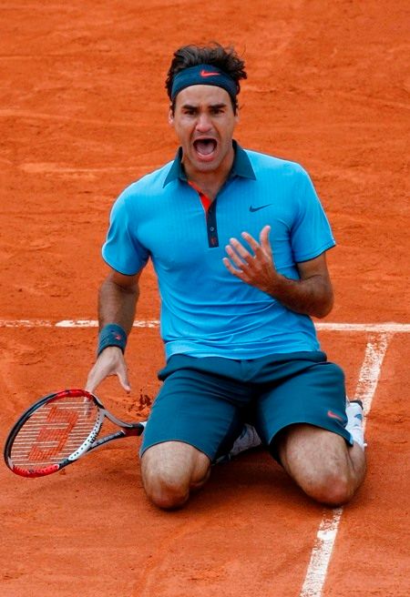 Roger Federer se raduje z premiérového titulu v Roland GarrosRoger Federer se raduje z premiérového titulu v Roland Garros. | Foto: Václav Rojík