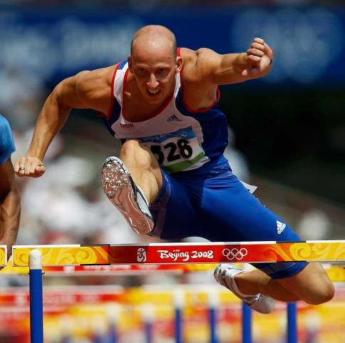 Petr Svoboda při olympijském rozběhu | Foto: Reuters