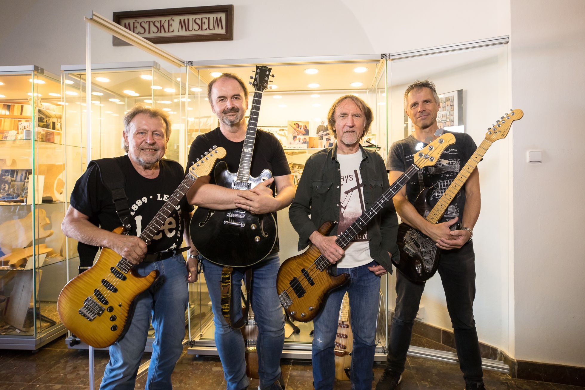 Photo: Clapton, ZZ Top and Ledecký.  All are joined by a Czech guitar master, presented by an exhibition in Jílové