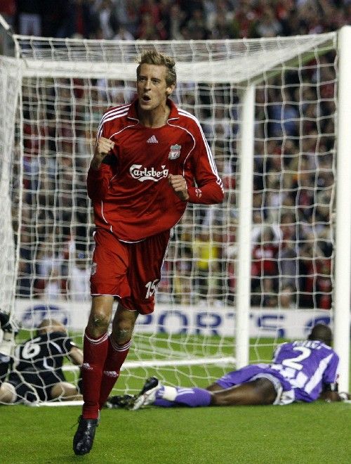 Liverpoolský Peter Crouch se raduje z gólu do sítě Toulouse v třetím předkole Ligy mistrů. | Foto: Reuters