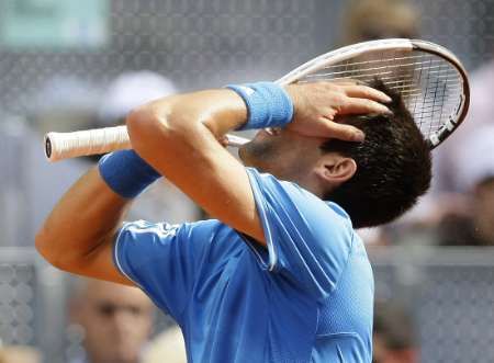 Novak Djokovič reaguje při semifinále turnaje v Madridu při utkání s Rafaelem Nadalem. | Foto: Václav Rojík