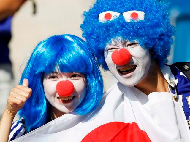 Japonští fandové mohli být po první půli spokojeni, jejich tým neinkasoval. | Foto: Reuters