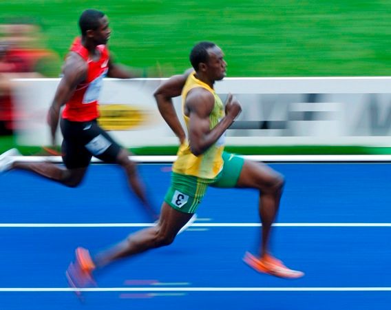 Usain Bolt v rozbězích na MS v Berlíně | Foto: Reuters