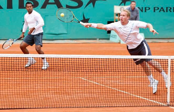 Lukáš Dlouhý a Leander Paes | Foto: Reuters