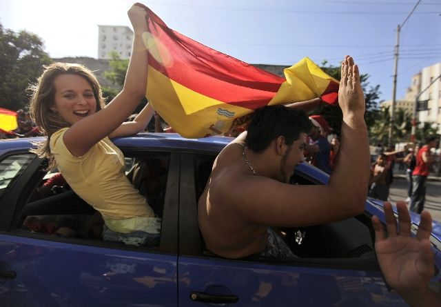 ... se slavilo i v kubánské Havaně. | Foto: Reuters