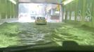 A car passes through a flooded tunnel following torrential rains, in Toronto, Canada, July 16, 2024, in this screen grab taken from a social media video. BRYAN MASON/via