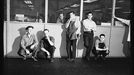 Detroit, Michigan. Assembly of Rolls Royce engines at the Packard motor car company. Workmen smoking cigarettes in an aisle during a five minute recess