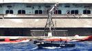 The bow of the Costa Concordia cruise liner is seen as it emerges during the refloating operation at Giglio harbour July 20, 2014.