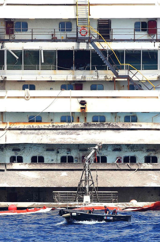 The bow of the Costa Concordia cruise liner is seen as it emerges during the refloating operation at Giglio harbour July 20, 2014.