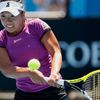 Kurumi Nara of Japan hits a return to Peng Shuai of China during their women's singles match at the Australian Open 2014 tennis tournament in Melbourne