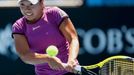 Kurumi Nara of Japan hits a return to Peng Shuai of China during their women's singles match at the Australian Open 2014 tennis tournament in Melbourne January 14, 2014.