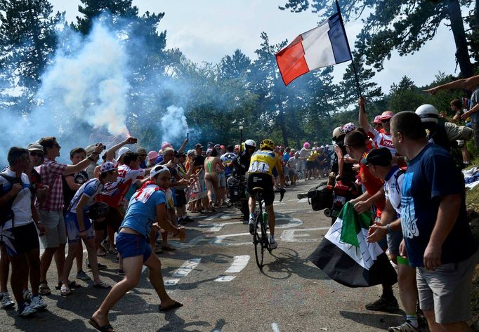 Race leader's yellow jersey Team Sky rider Christopher Froome of Britain climbs the Mont Ventoux during the 242.5 km fifteenth stage of the centenary Tour de France cycli